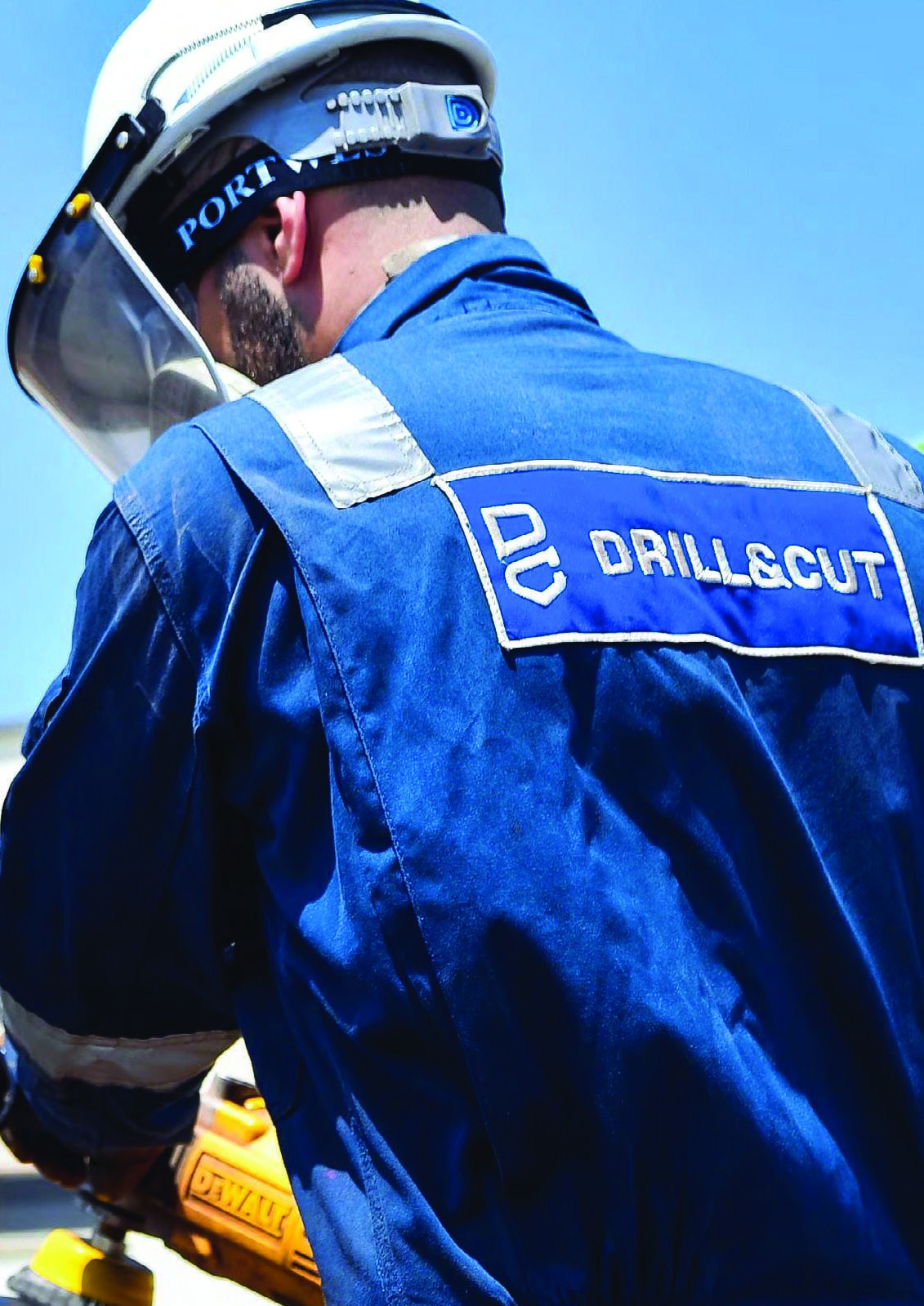 Drill & Cut inspection technician wearing branded protective workwear